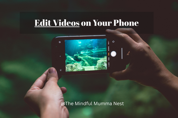 Hands holding a phone while editing video footage, showing how to edit videos on your phone – The Mindful Mumma Nest.