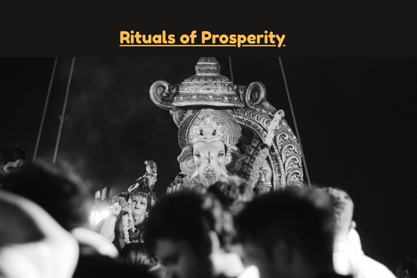 Ganesh idol surrounded by devotees during rituals of prosperity celebration