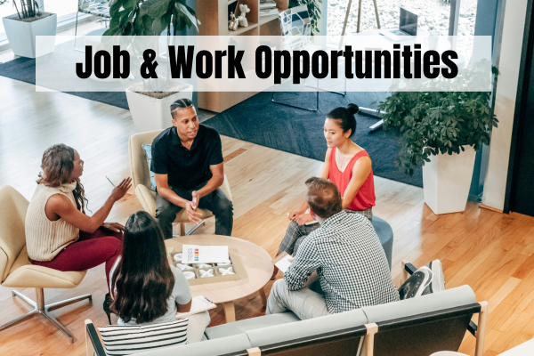 Group of professionals discussing work opportunities in a modern office setting
