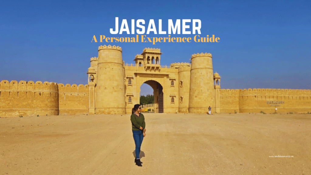 A traveler standing at the entrance of Jaisalmer Fort during winter, sharing a personal travel experience in Jaisalmer, Rajasthan